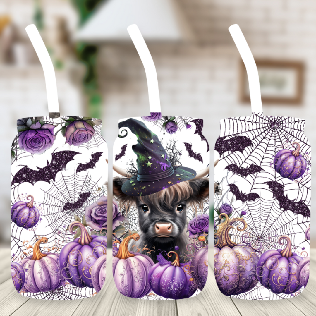 16 oz Sublimation glass can with a black highland cow and purple pumpkins and glitter bats with cobwebs